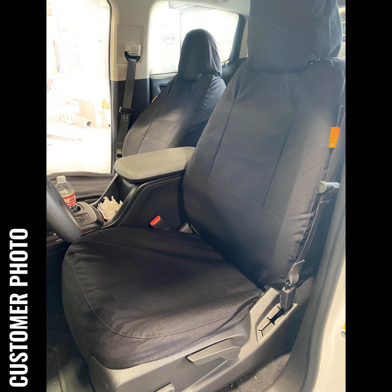 Chevy Colorado or GMC Canyon with TigerTough black custom fit waterproof seat covers.