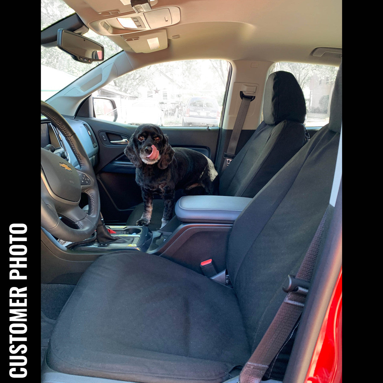 Chevy Colorado or GMC Canyon with TigerTough black custom fit waterproof seat covers.