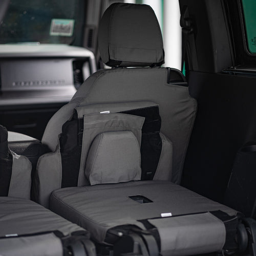 Tiger Tough's seat covers for the Ford Bronco work with the seat features and allow you to fold up the seat like normal.